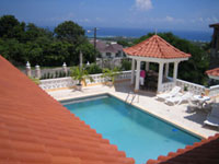 Chateau Gloria - Hotels And Private Villas In Montego Bay, Jamaica  - Hotels Jamaica - Villas Jamaica, Paradise Vacations Jamaica Ltd, a full service vacation company located in Jamaica that specialize in hotel / accommodation and villa bookings; airport taxi, limousine, charter, and transportation services to and from your hotel; and  sightseeing and cultural tours and excursions throughout the Island of Jamaica - http://www.paradisevacationsjamaica.com; E-mail: paradisevacationsja@yahoo.com